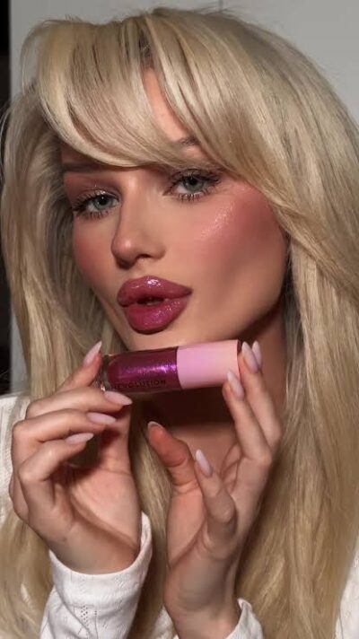 لیپ گلاس شاین‌دار رولوشن مدل Shimmer Bomb رنگ Daydream Pink