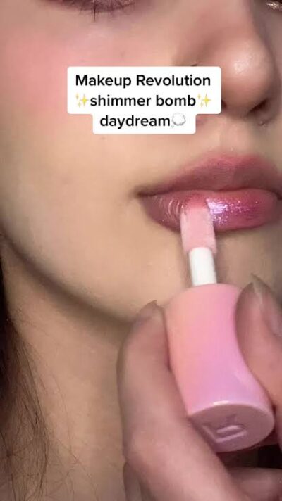 لیپ گلاس شاین‌دار رولوشن مدل Shimmer Bomb رنگ Daydream Pink